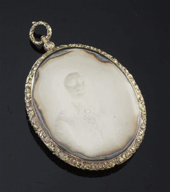 An oval Victorian daguerreotype mourning pendant, overall 3.25in. including hanging loop